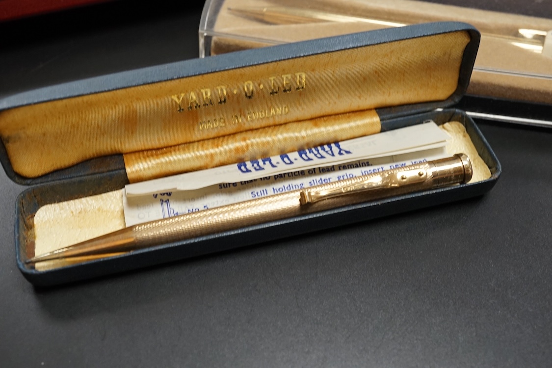 Four assorted cased Waterman pens, elven other assorted pens including Scheaffer and Parker and an engine turned silver pen.